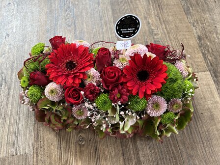 Bloemstuk rode tinten