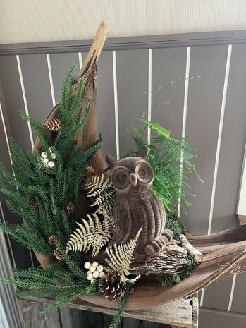 bloemstuk op palmblad uil goud en bruine tinten